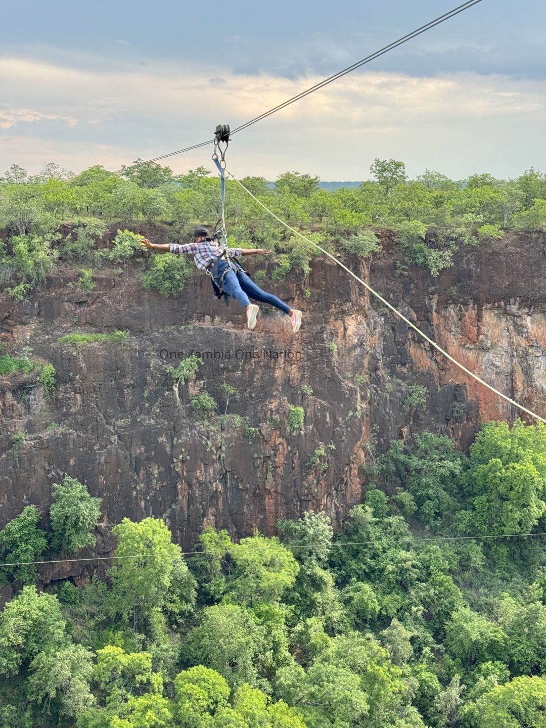 Person ziplining over Batoka Gorge near Victoria Falls